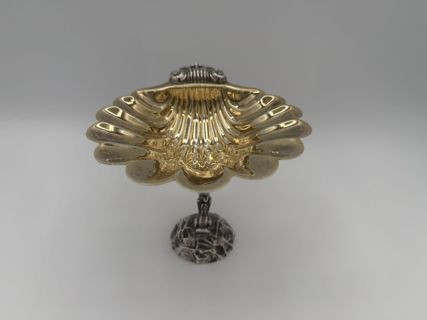 Fine Antique English Silver Master Salt Cellar w/ a dolphin-shaped base and a shell-shaped bowl